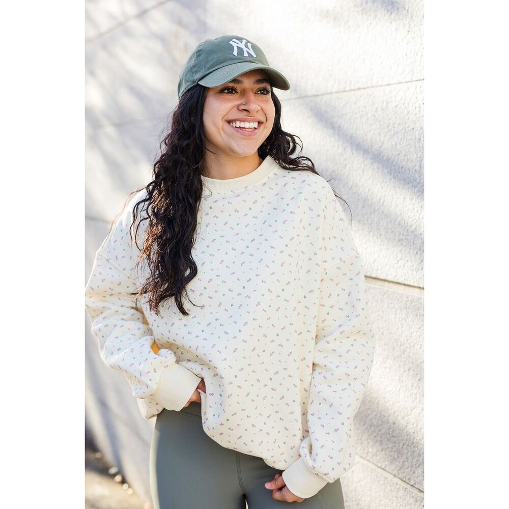 Sunkissed Floral Print Sweatshirt. This relaxed-fit, long-sleeve sweatshirt feat